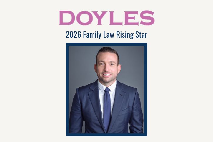 Image of Bradley with the Doyles logo